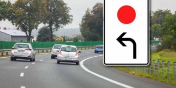 Знак зі стрілкою та червоною крапкою: що він означає